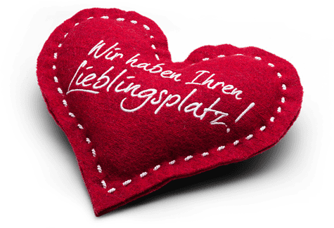 Plüschiges rotes Herz mit Liebestext.